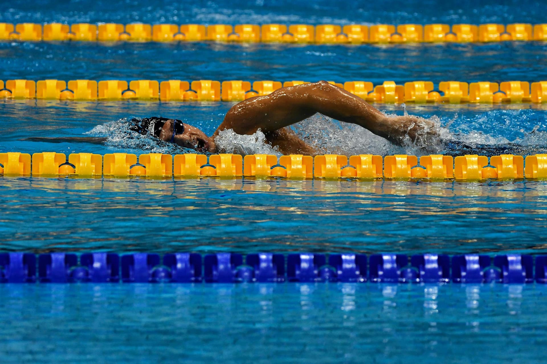 Competitive swimmer in a tech suit